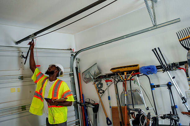 Professional Garage Door Panel Replacement technician working in Chisholm, ME