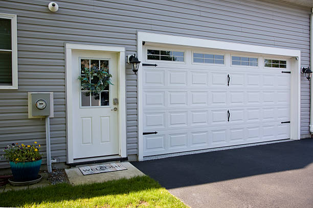 24/7 Emergency Garage Door Panel Replacement experts in Chisholm, ME